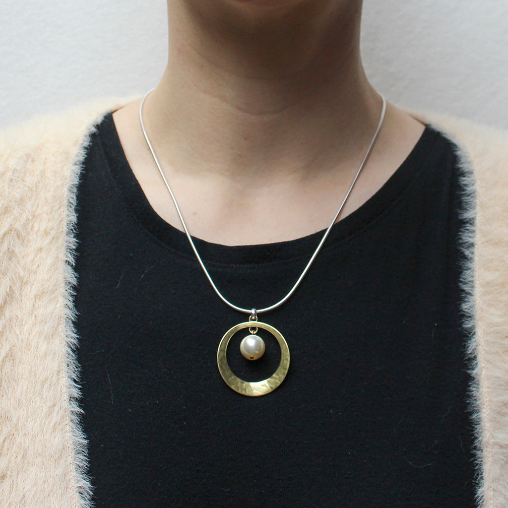 Marjorie Baer Necklace: Dished Cutout Disc with Cream Pearl Drop