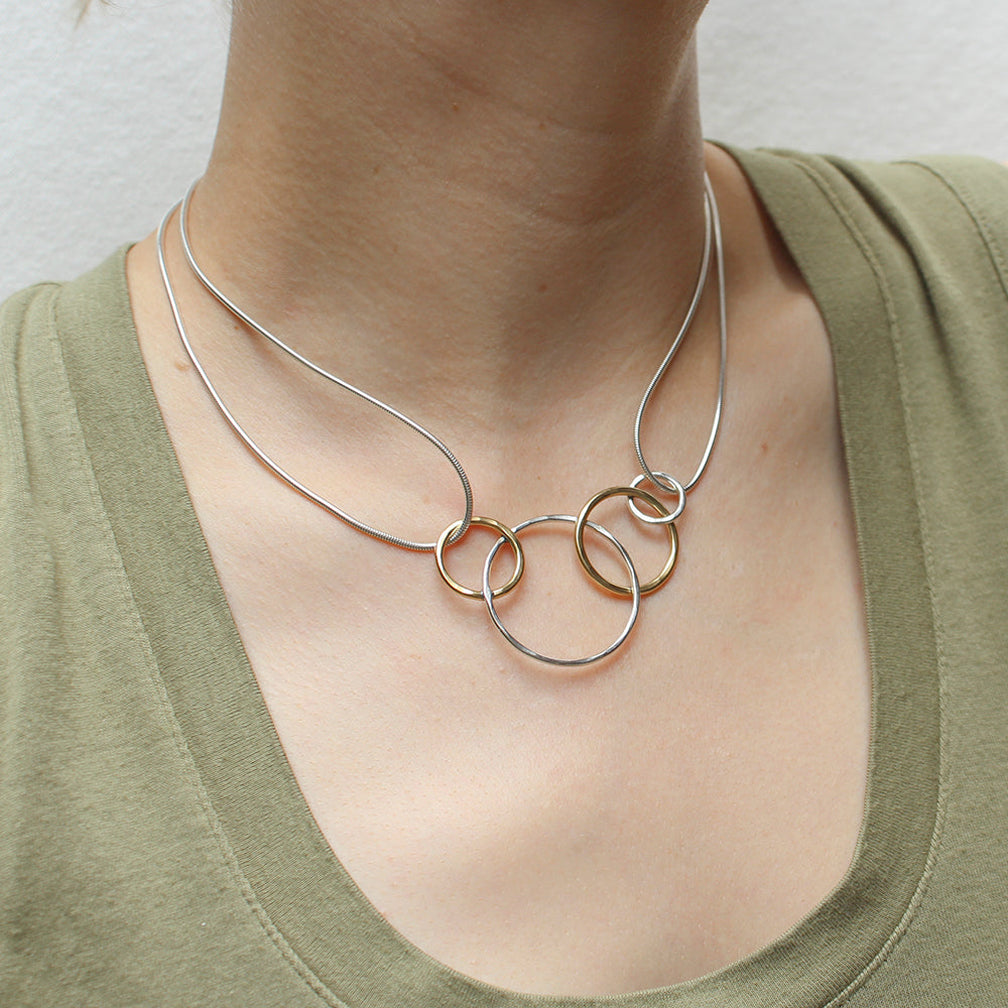 Marjorie Baer Necklace: Four Intertwined Hammered Rings