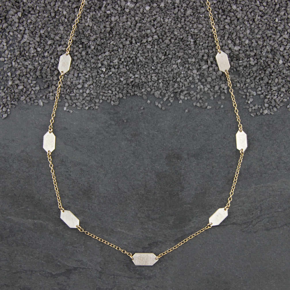Zina Kao Exclusives Necklace: Seven Linked Small Diamond Points, Silver with Gold Chain